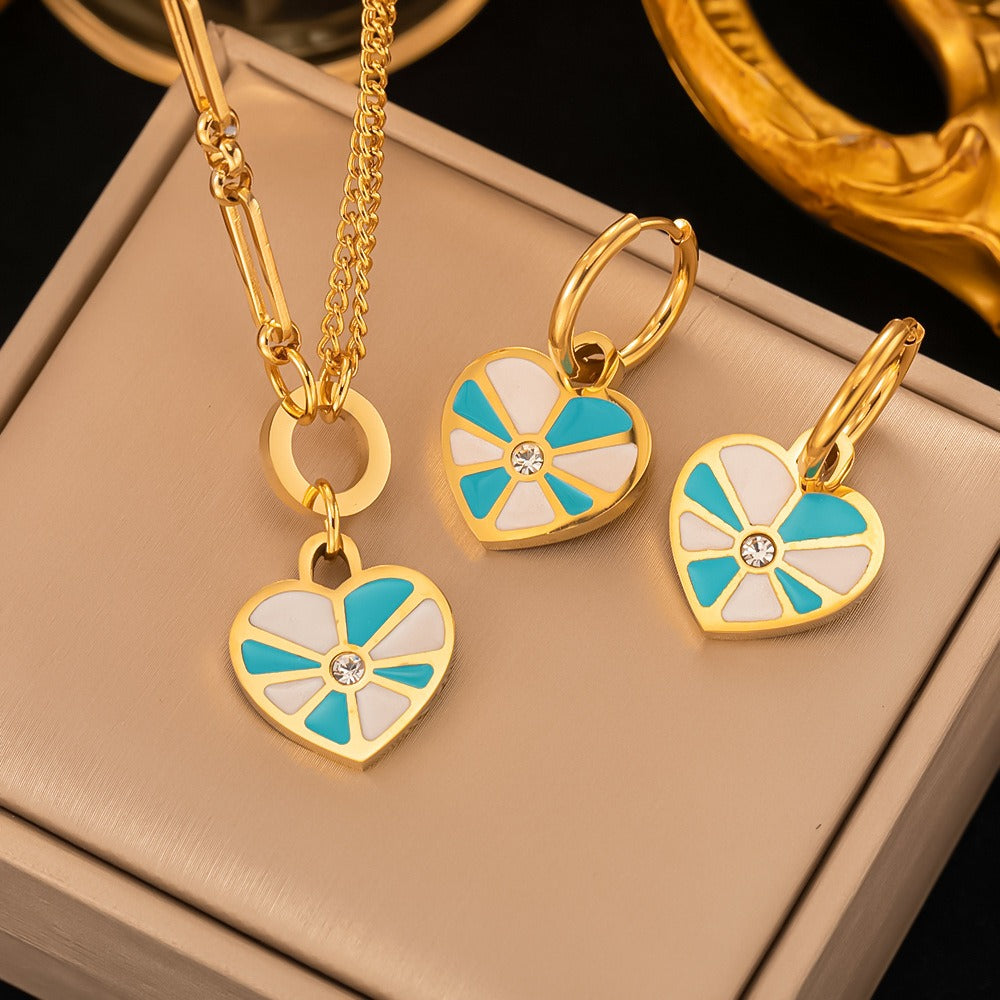 Geometric enamel heart necklace and earring set.