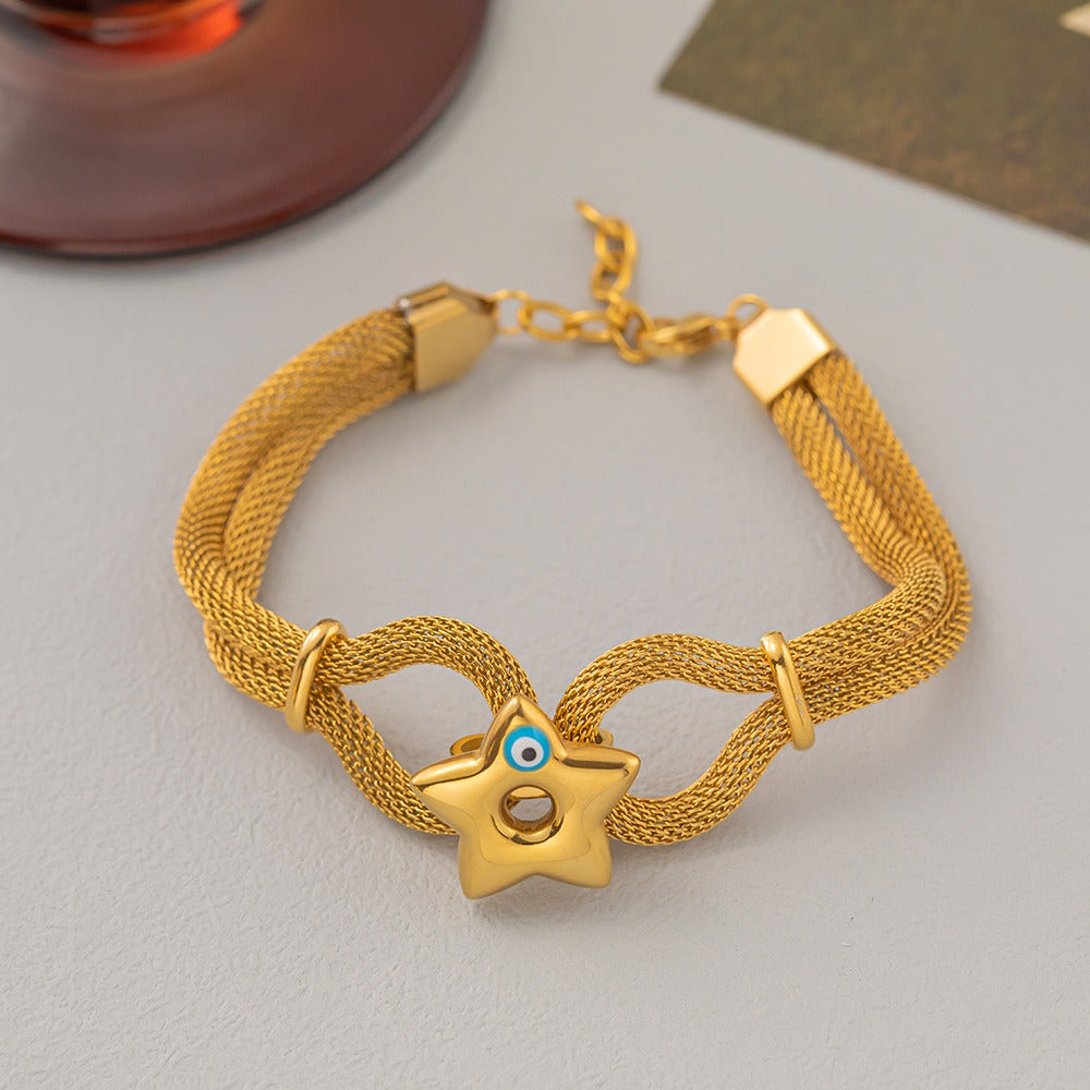 bracelet with a central star and Turkish eye charm.