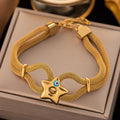 bracelet with a central star and Turkish eye charm.