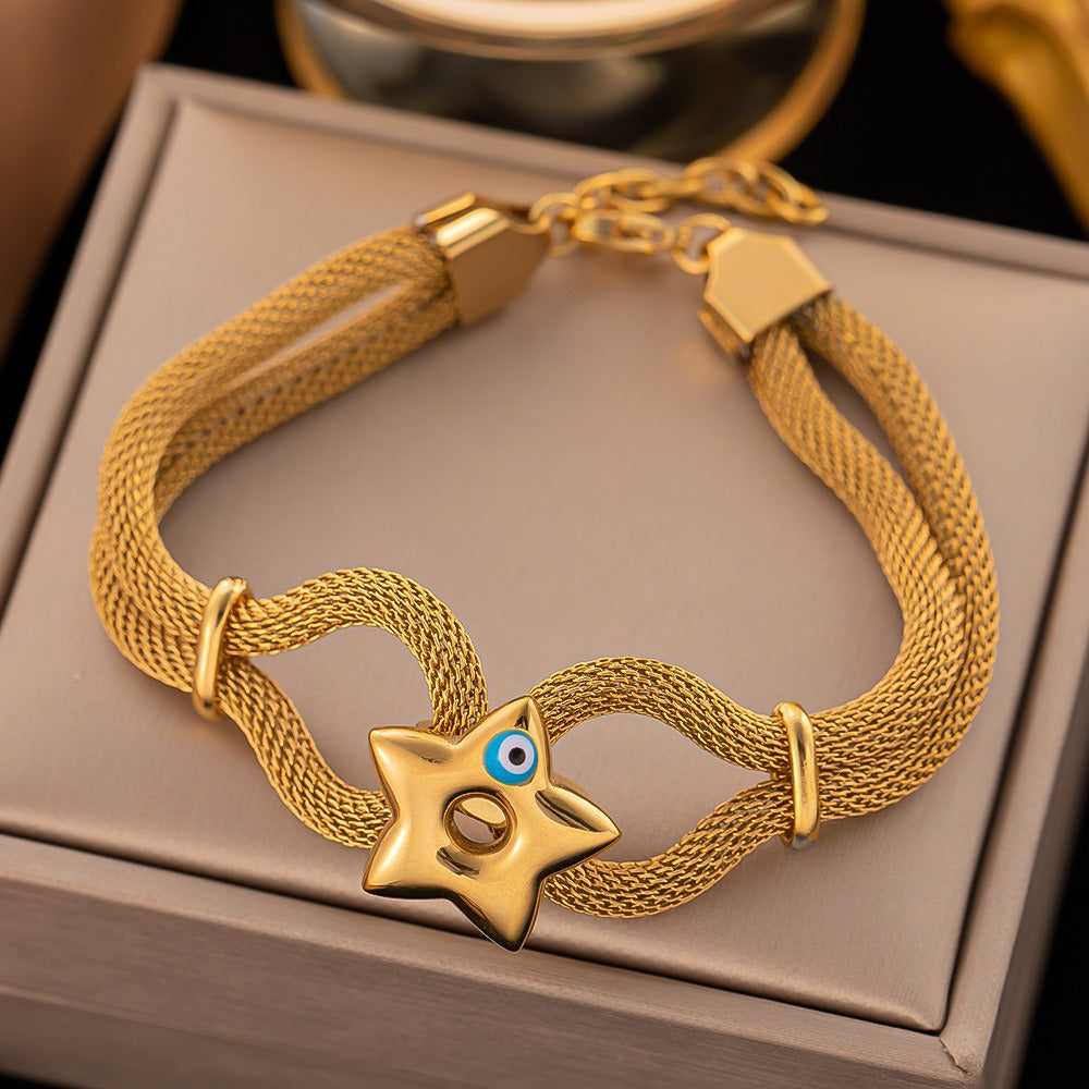 bracelet with a central star and Turkish eye charm.