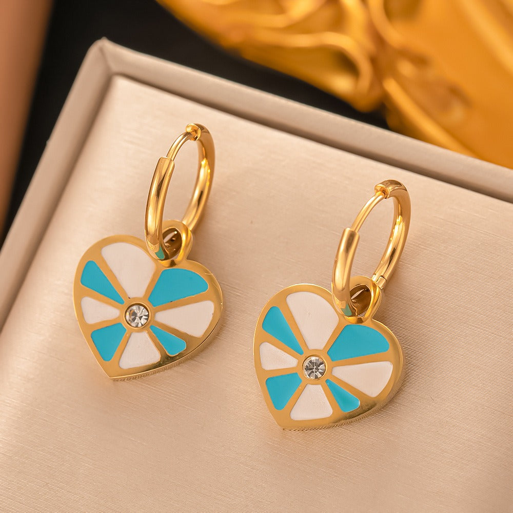 Geometric enamel heart necklace and earring set.