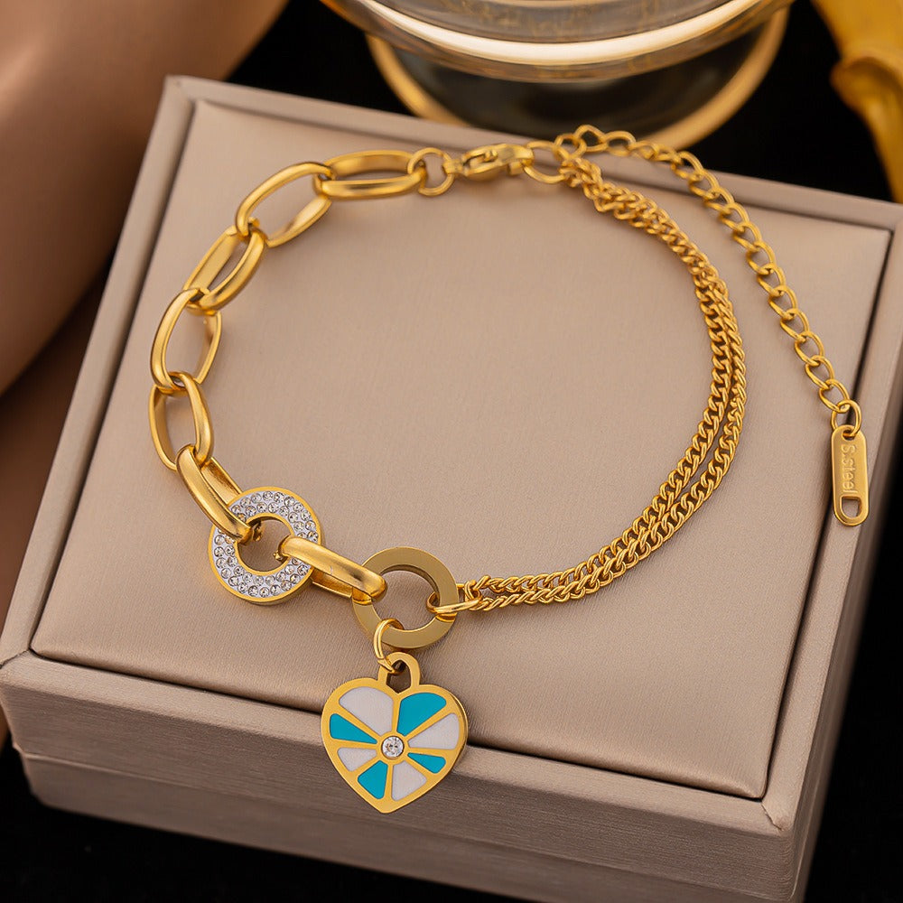 Geometric enamel heart necklace and earring set.